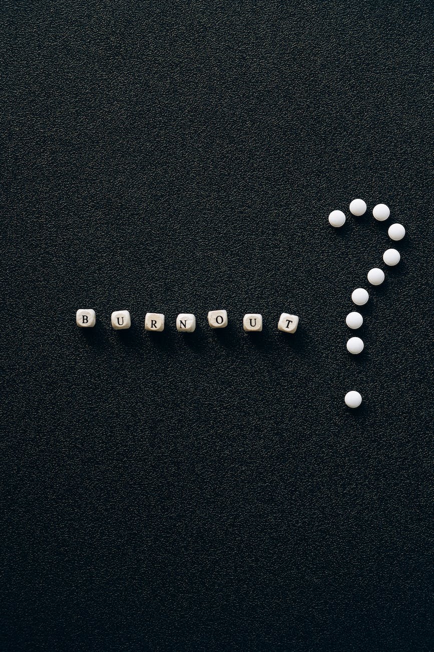 letter beads on black surface